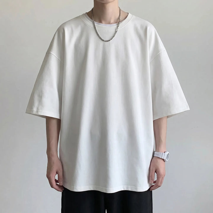 Luźny jednokolorowy t-shirt z okrągłym dekoltem - Oscar